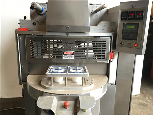 Rotary tray sealer