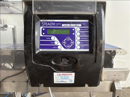 Metal detector checkweigher