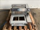 Mantle packaging twin tray sealer